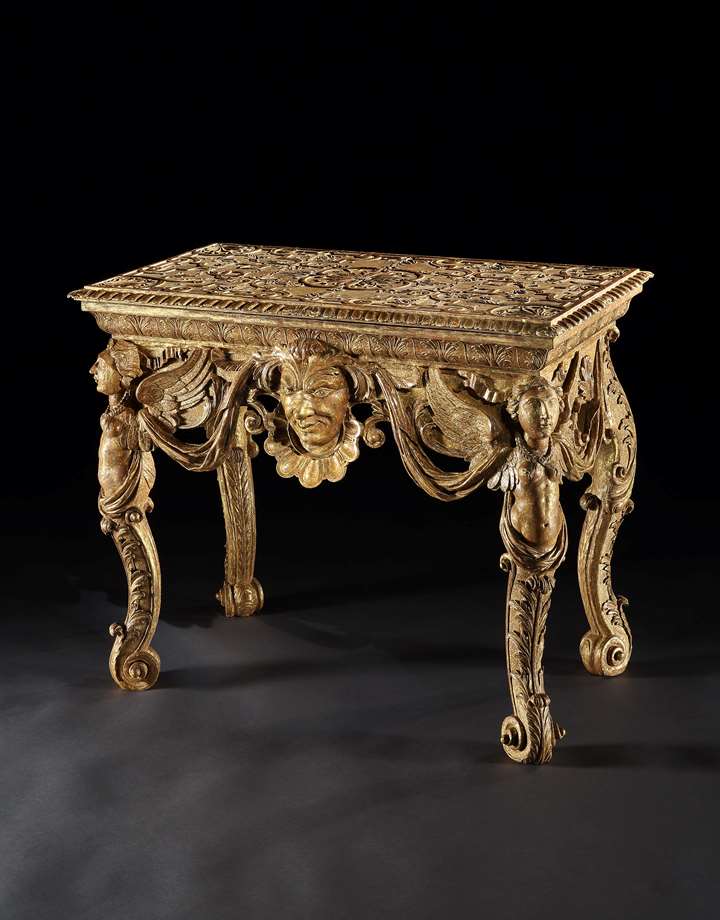 AN IMPORTANT QUEEN ANNE GILTWOOD AND GESSO TABLE TO A DESIGN BY DANIEL MAROT